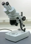 Meiji VMT-2 Stereo Microscope, Complete With Dual Illumination Stand. Fixed Price $485.00.