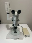 Nikon SMZ800 Stereomicroscope With Photo Port And Transmitted/reflected Light. Fixed Price $4450.00.