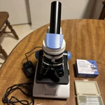 Amscope 40X-10X-WF25X Dual Light Glass Monocular Student Microscope With Supplie. Fixed Price $55.00.