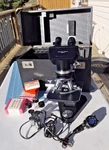 Used Ernst Leitz Wetzlar Microscope W/ Case & Lens Light. Fixed Price $250.00.