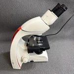 Leica DM750 Microscope W/ Objectives. Fixed Price $815.00.