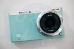 Samsung Mini Camera W/ Nx-m 9-27MM F3.5-5.6 Ed Ois Lens. Fixed Price $235.00.