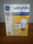 4 New In Box - Ge Light Bulbs, 100W, Soft White Pack Uses 28% Less Energy. Fixed Price $42.49.