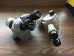 Pair Of Nikon Microscope Heads Smz 645 & SM2 1B. Fixed Price $450.00.