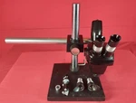 Bausch Lomb 1X-2.5X AT418312929 Microscope Head With Stand Accessories. Fixed Price $495.00.