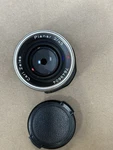 Carl Zeiss Planar T* 2/45 45MM F/2 Manual Focus Standard Lens Silver. Fixed Price $395.00.