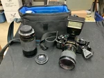Olympus Ompc 35MM Camera With 2 Lenses And Flash Inside Bag. Fixed Price $149.63.