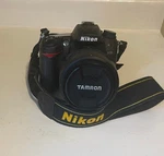 Nikon D7000, Tamron Piezo Lens, Tripod & Cases. Fixed Price $225.00.