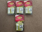 4 Packs Of Small Pairs Command Damage-free Hanging Strip 17205-16ES Hold Lb. Fixed Price $27.50.