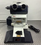 Leica Dmrxe Microscope 020-525.027 W/ Two Objectives & Eyepieces 507808 10X25. Fixed Price $1300.00.
