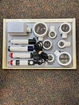 Eschenbach Illuminated Handheld Magnifier Set With 4 Handles 8 Heads. Fixed Price $1000.00.