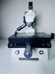 Mitutoyo TM-505 Toolmakers Microscope 15X Eyepiece Working Stage Micrometers. Fixed Price $1150.00.