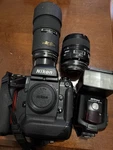 Nikon F5 Camera, Af Nikkor 180MM & 60MM Lenses, SB-28 Flash, Filters Lot. Fixed Price $700.00.