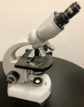 Carl Zeiss Microscope 9901, 47-30-11 W/ Objectives And Variable Light Source. Fixed Price $1333.00.