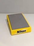 Genuine Nikon Camera Display Stand 7.25 X 2.5 Inches. Fixed Price $25.00.