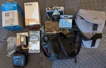 Olympus OM-2N Camera +three Lenses Filters +e Flash Manuals+ Batteries. Fixed Price $290.00.