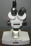Omano Binocular Zoom Stereo Inspection Microscope Double Wide Base Dual Halogen. Fixed Price $250.00.