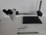 Nikon SMZ745 Microscope With 10X Eyepieces, 0.5X Objective & Focusing Boom Stand. Fixed Price $1495.00.