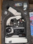 Compound Microscope, 40X-2500X, WF10X And WF25X Eyepieces, Dual Lighting & Mecha. Fixed Price $100.00.
