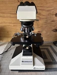 Fisher Scientific 12-561B Microscope W/ PL4/0.1,PL10/0.25,PL 40/0.65,PL 100/1.25. Fixed Price $89.10.