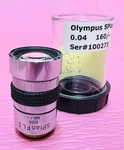 Olympus Plan 1X/0.04 Fluorite Microscope Objective Lens 160MM. Fixed Price $299.00.