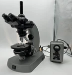 Carl Zeiss Universal Research Microscope W/objectives & Eyepieces +power. Fixed Price $860.99.