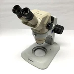 Olympus SZ4045 Binocular Stereo Microscope 0.67-4X Zoom W/ 10X Eyepieces & Stand. Fixed Price $650.00.