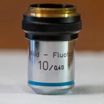 Wild Heerbrugg 10X Fluotar Objective Lens Microscope Part. Fixed Price $125.00.