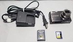 Nikon Coolpix S710 14.5MP Digital Camera - Missing Battery Door For Parts. Fixed Price $17.94.