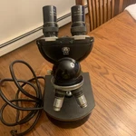 Carl Zeiss - Binocular Microscope With Four Objective Lenses. Fixed Price $75.00.