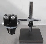 T185252 Reichert Stereo Star Zoom 570 Microscope W/ Boom Stand. Fixed Price $300.00.