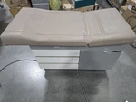 Midmark Ritter 104 Exam Table - Gray/beige Scratch & Dent. Fixed Price $844.81.