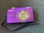 Nikon Camera Coolpix 55100 Purple. Fixed Price $210.46.