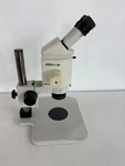 Leica MZ95 Microscope With 0.63X Planapo Objective, 10X Eyes, Focusing Stand. Fixed Price $2450.00.