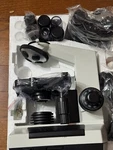 Lw Scientific Revelation Lll Din Plan 4 Objective Binocular Microscope. Fixed Price $850.00.