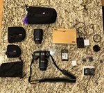 Nikon D7000 + Extra Lenses, Batteries, And Accessory Bag. Fixed Price $580.00.