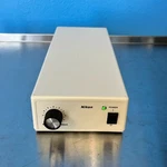 Nikon Microscope Lamp Power Supply Unit TE2-PS100W, 100-240 Vac In, Output: 12V. Fixed Price $995.00.