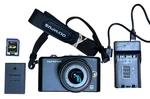 Olympus Pen Mini E-PM1 Mirrorless Digital Camera With Zuiko 14-42MM Lens Charger. Fixed Price $165.00.