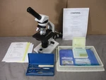 National Optical Model 131-CLED Compound Microscope W/ Accessories & Slides. Fixed Price $160.00.