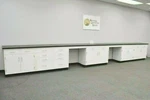 24' Fisher American Laboratory Cabinets W/ Countertops Two Desks E1-218. Fixed Price $9360.00.
