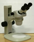 New Nikon SMZ445 SMZ-445 Stereo Zoom Microscope W/plain Stand, 10X Eyepieces. Fixed Price $1499.00.