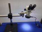Scienscope SSZ-2 Stereo Zoom Microscope 6.7-45X Boom Stand Led Ring Light. Fixed Price $795.00.