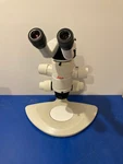 15169 Leica MZ12.5 Microscope W/ Bottom Lens 1X Eyes 16X/14B On Stand. Fixed Price $3150.00.