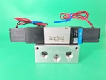 New Oem Koganei A183-4E2 Double Solenoid Valve W/ 1/4 Npt Manifold 24V Dc. Fixed Price $199.27.